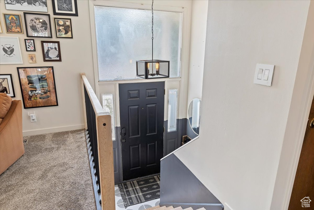 View of carpeted entrance foyer