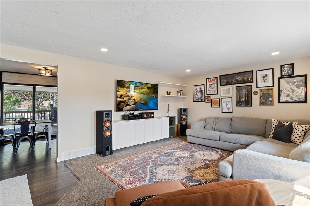 Living room featuring hardwood / wood-style flooring