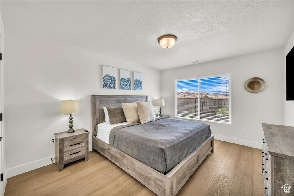 Bedroom featuring light hardwood / wood-style flooring