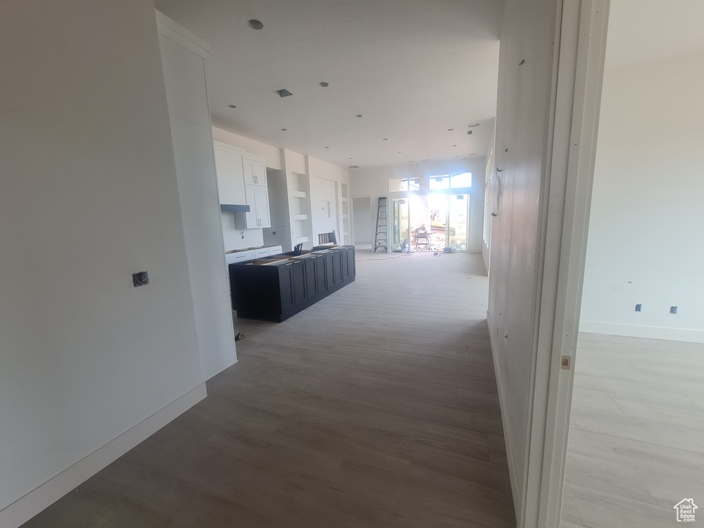 Hall featuring light hardwood / wood-style floors