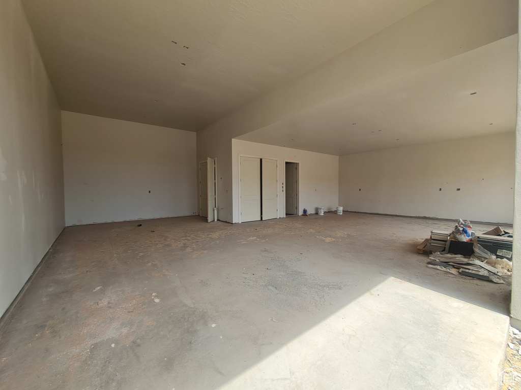 Interior space featuring concrete flooring