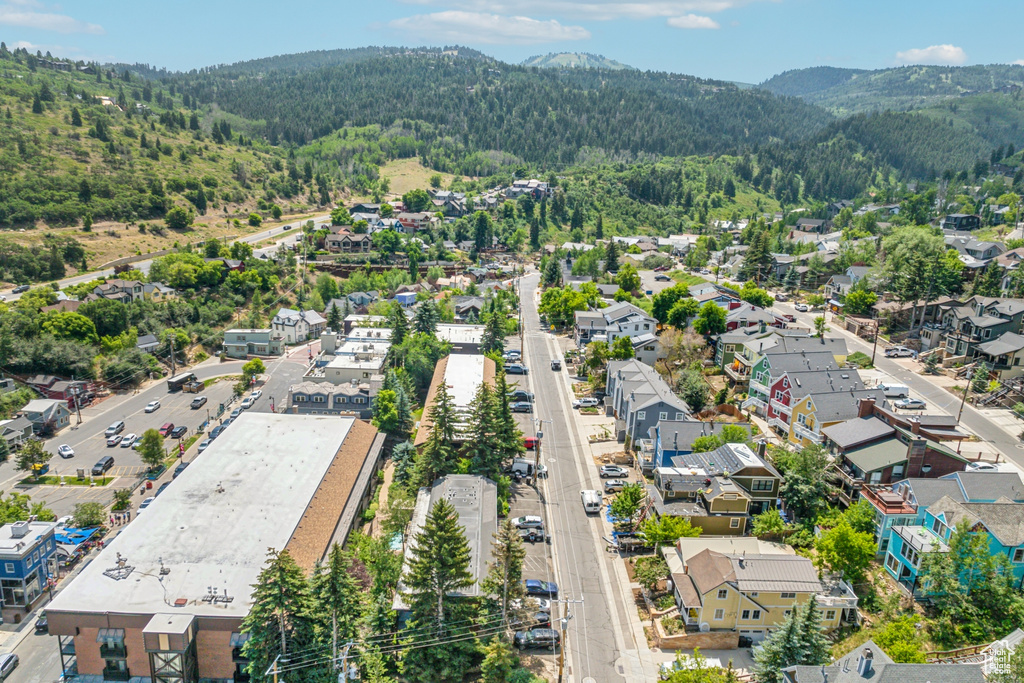 Birds eye view of property with a mountain view