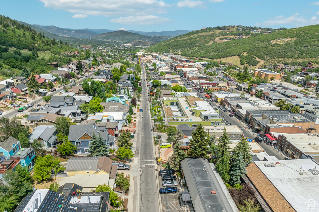 Birds eye view of property with a mountain view