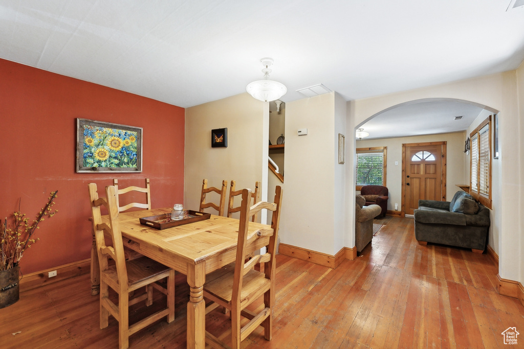 Dining space featuring wood-type flooring