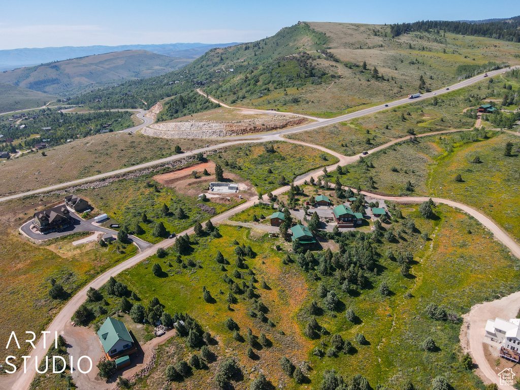 Drone / aerial view featuring a mountain view