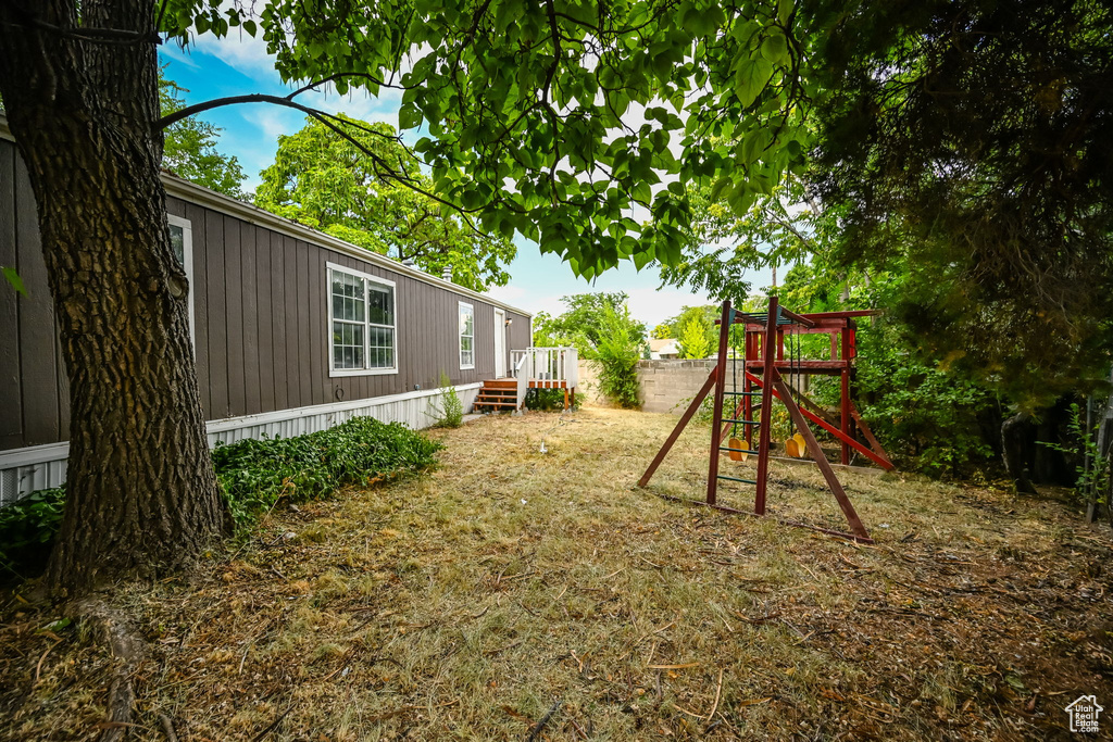 View of yard with a playground