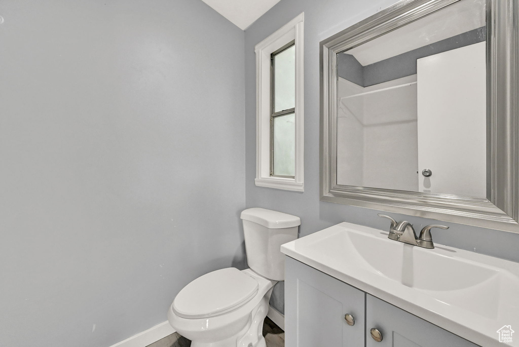 Bathroom featuring toilet and vanity