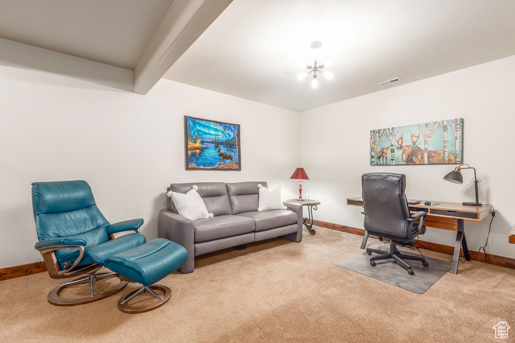 Home office with visible vents, carpet flooring, and baseboards