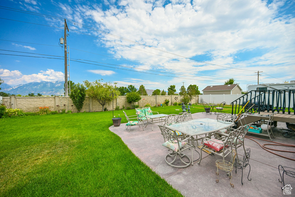 View of yard featuring a patio