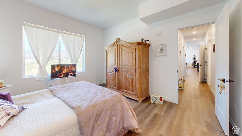 Bedroom featuring light wood-type flooring