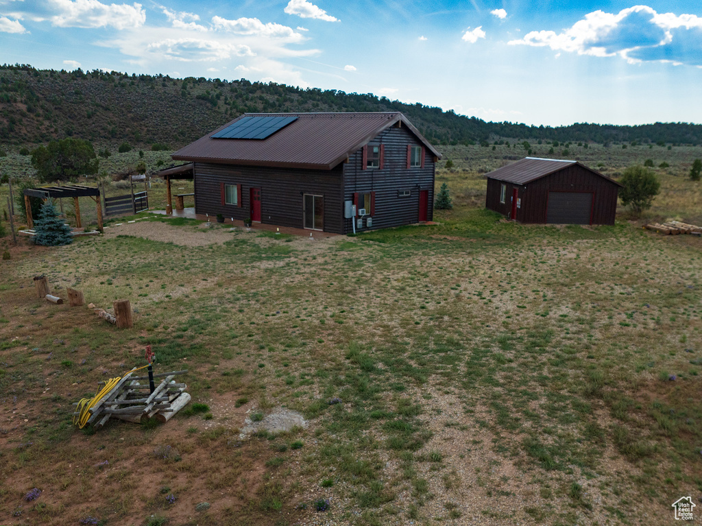 Exterior space featuring a mountain view