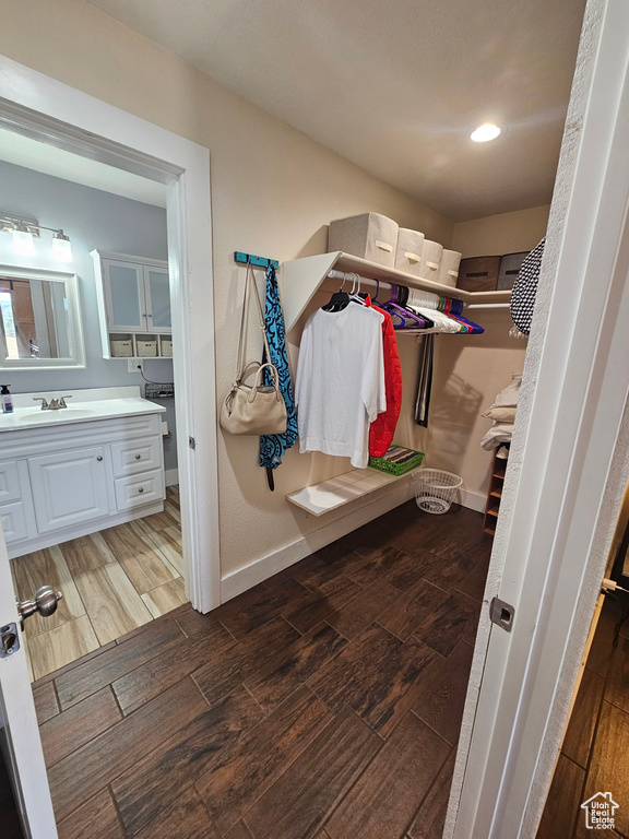 Bathroom with vanity and hardwood / wood-style flooring