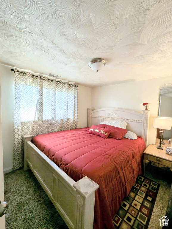 Bedroom featuring carpet flooring