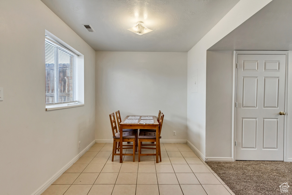 View of tiled dining space