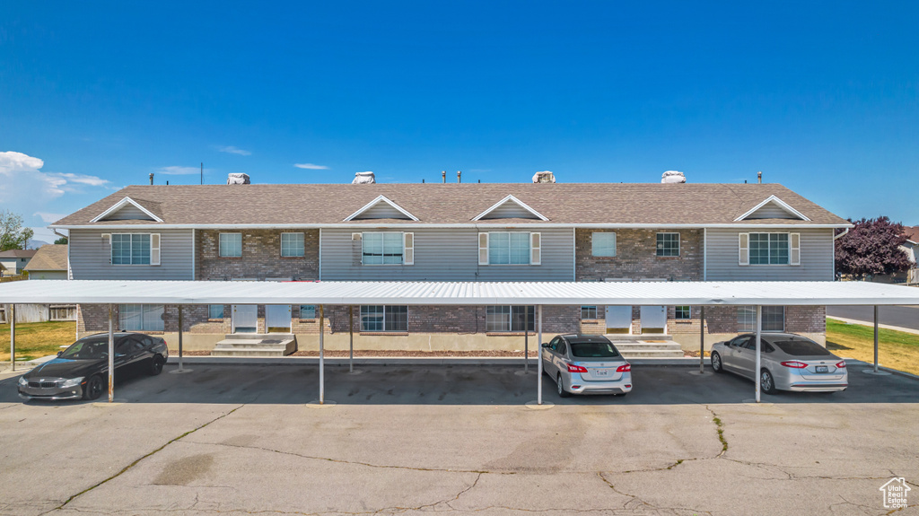 Multi unit property featuring a carport