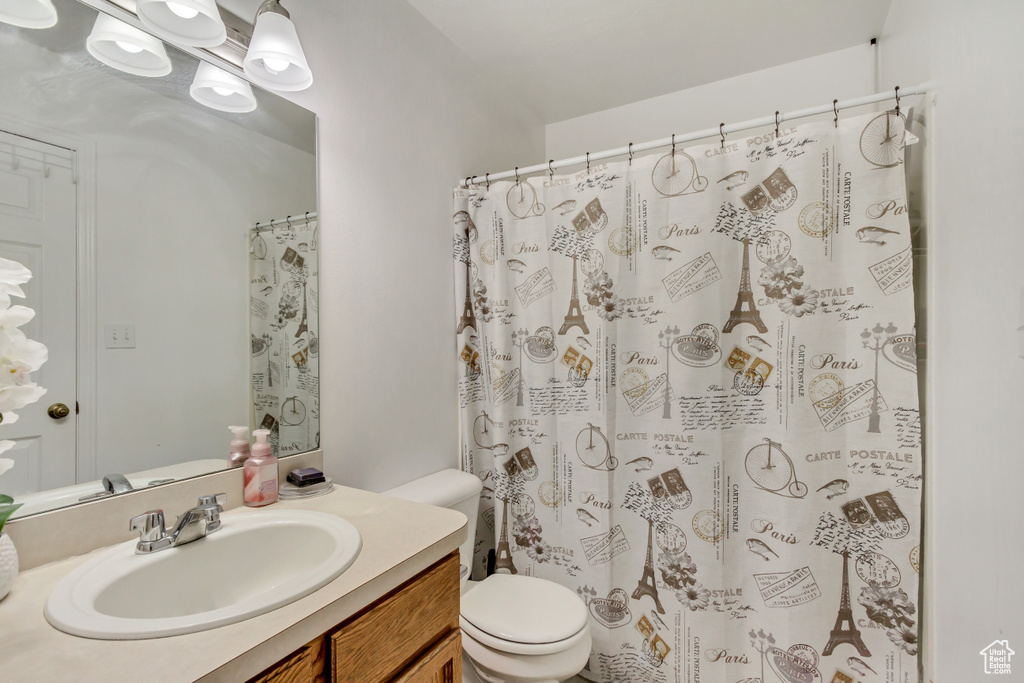 Bathroom with toilet and vanity