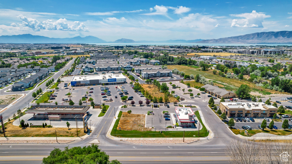 Birds eye view of property with a mountain view