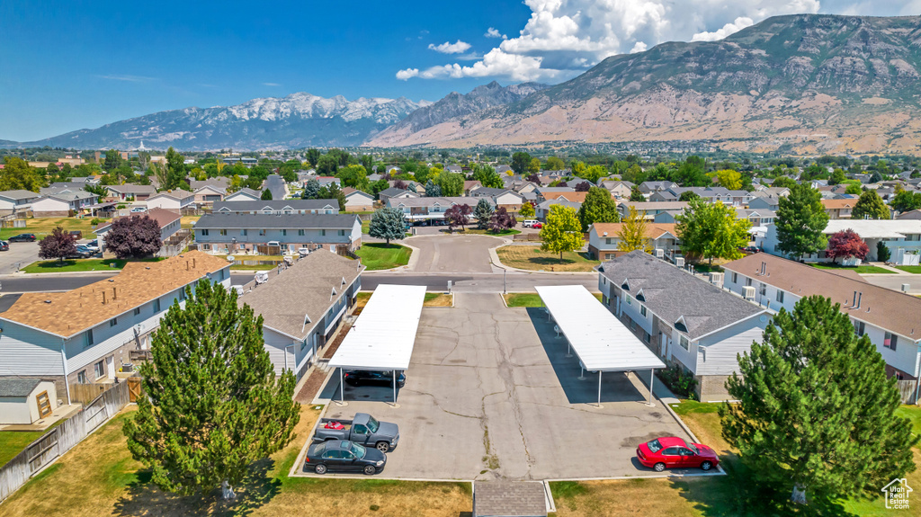 Birds eye view of property with a mountain view