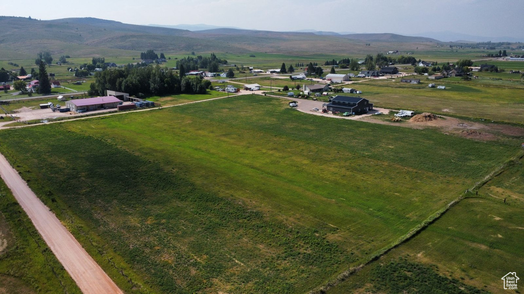 Aerial view with a mountain view and a rural view