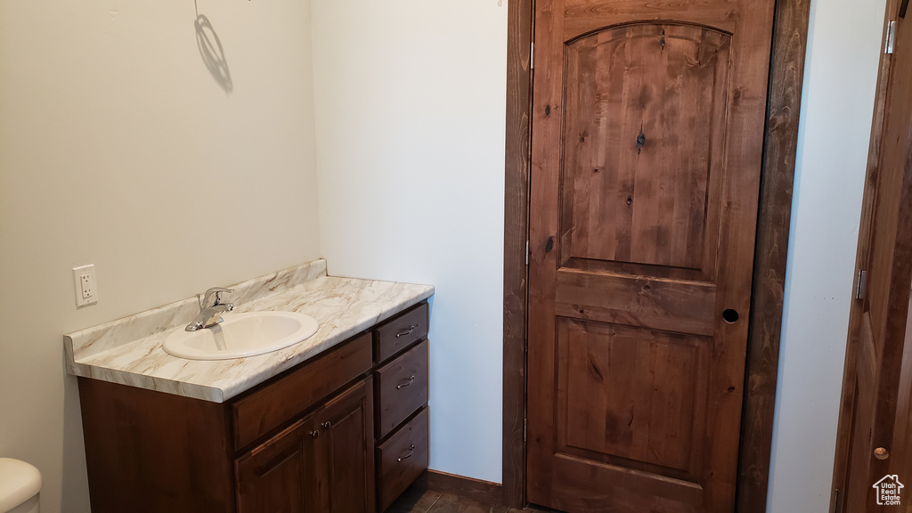 Bathroom featuring toilet and vanity