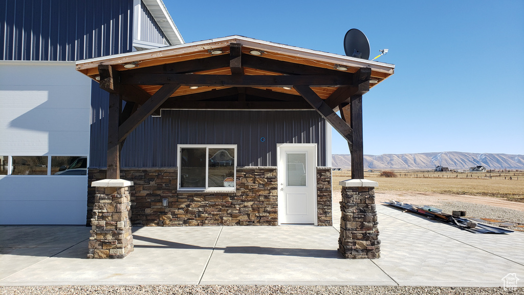 Exterior space featuring a mountain view