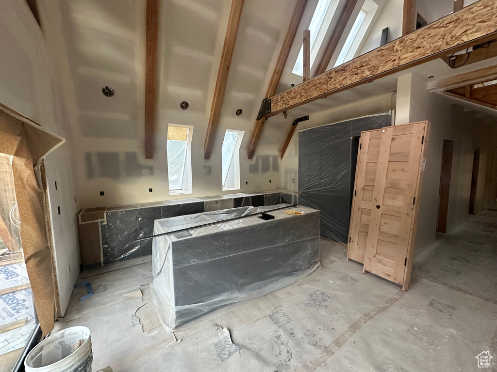 Kitchen featuring a towering ceiling