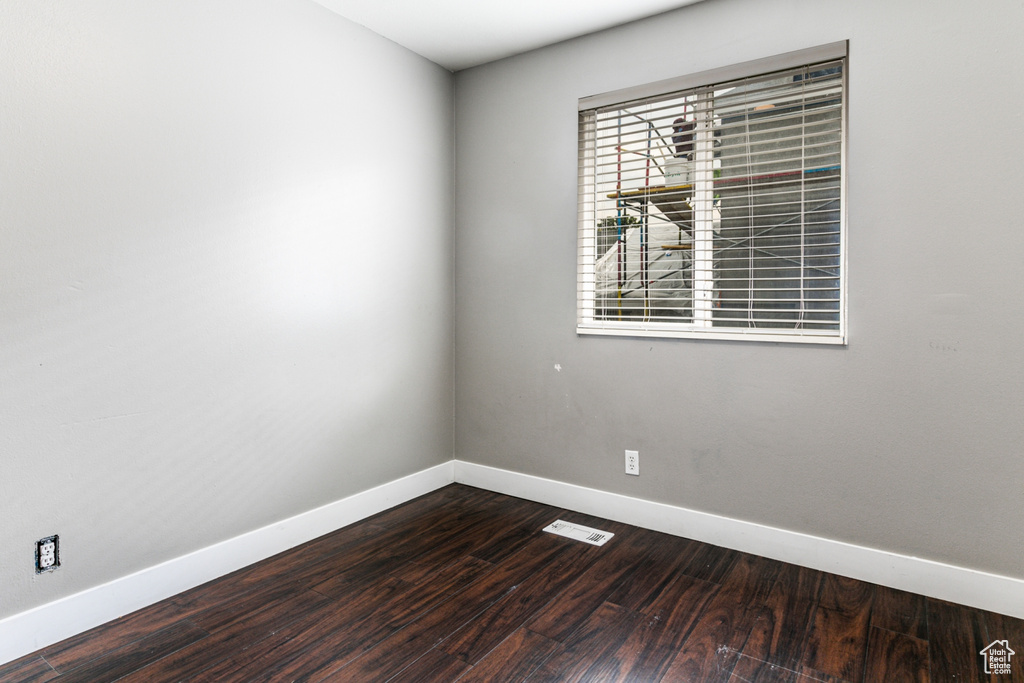 Unfurnished room with wood-type flooring