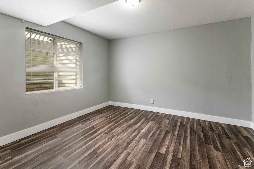 Spare room with hardwood / wood-style floors