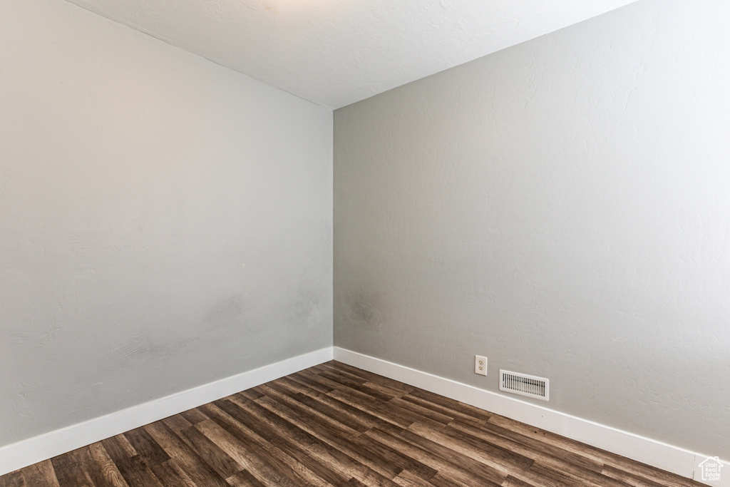 Unfurnished room with wood-type flooring