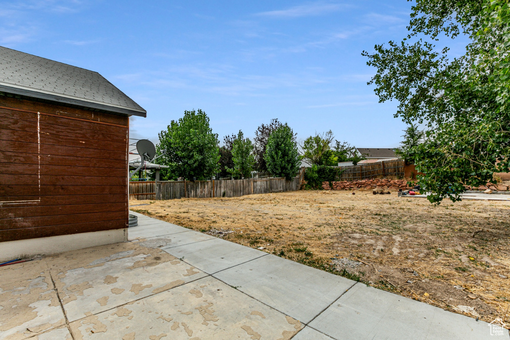 View of yard featuring a patio