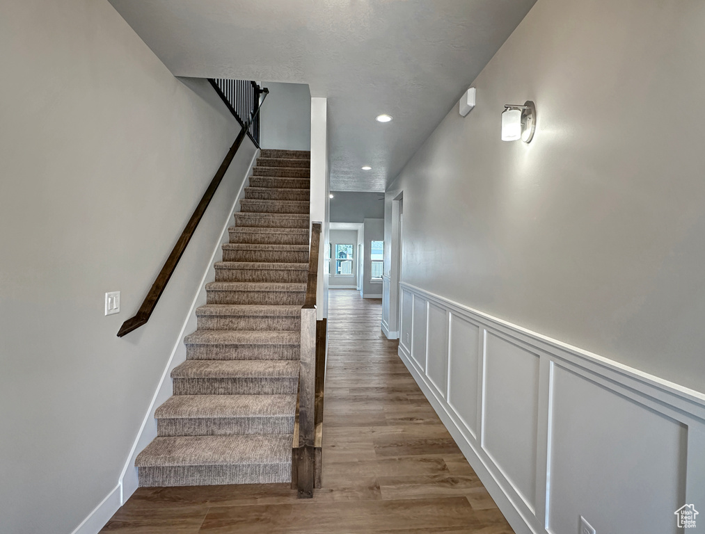 Staircase with wood-type flooring