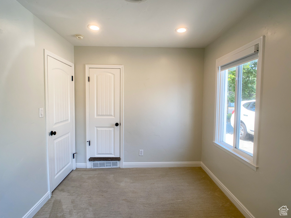 View of carpeted spare room