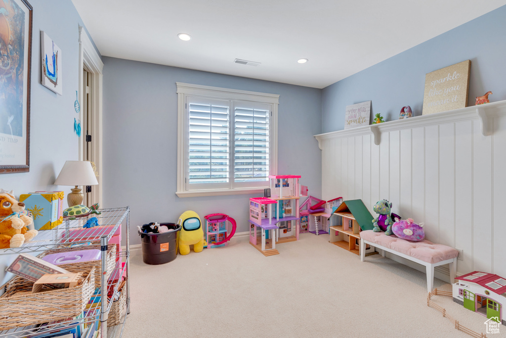 Playroom featuring carpet