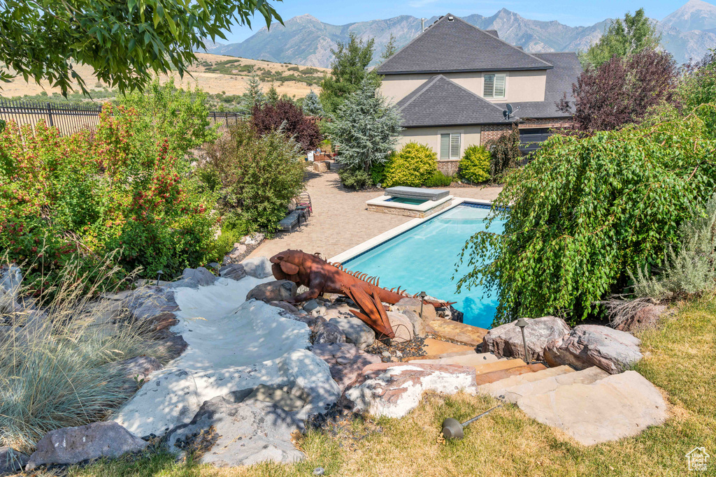 View of pool featuring a mountain view