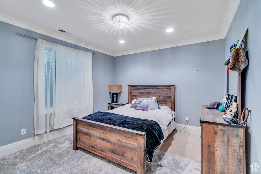 Bedroom with ornamental molding