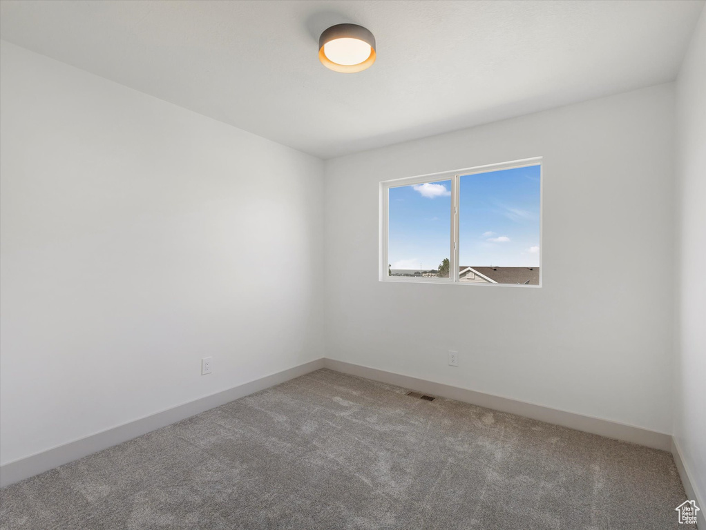 Empty room featuring carpet