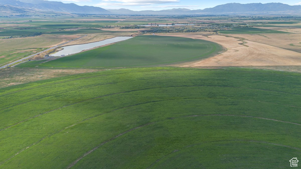 Bird\'s eye view featuring a water and mountain view and a rural view