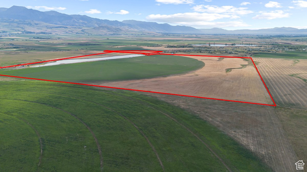 Drone / aerial view with a mountain view and a rural view