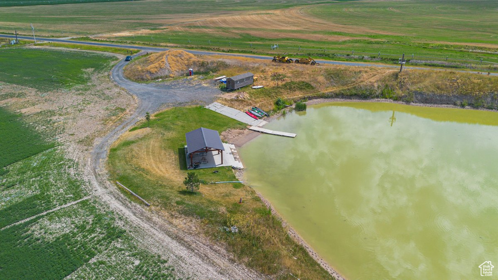 Aerial view featuring a water view and a rural view