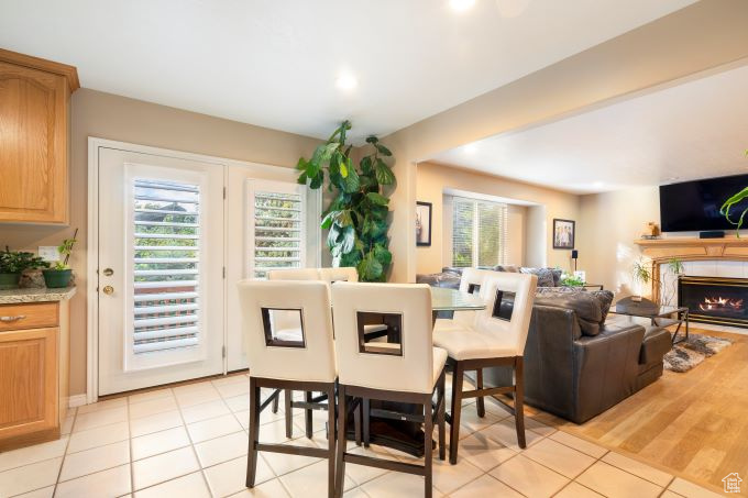 Tiled dining area with a wealth of natural light