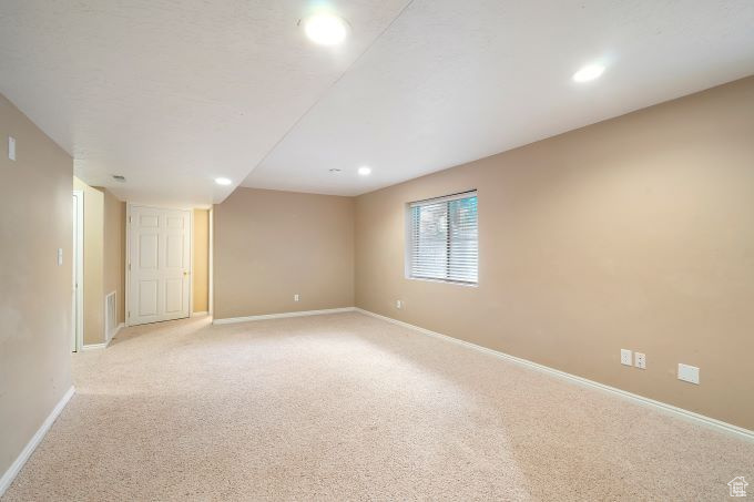 View of carpeted spare room