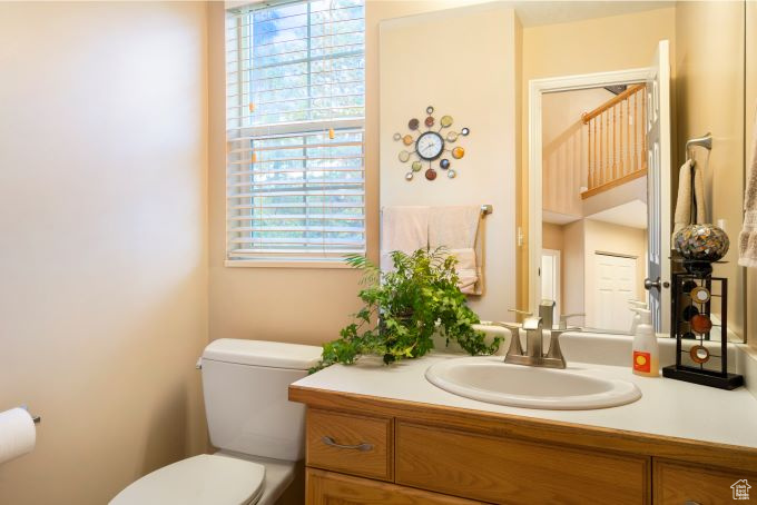 Bathroom featuring toilet and vanity