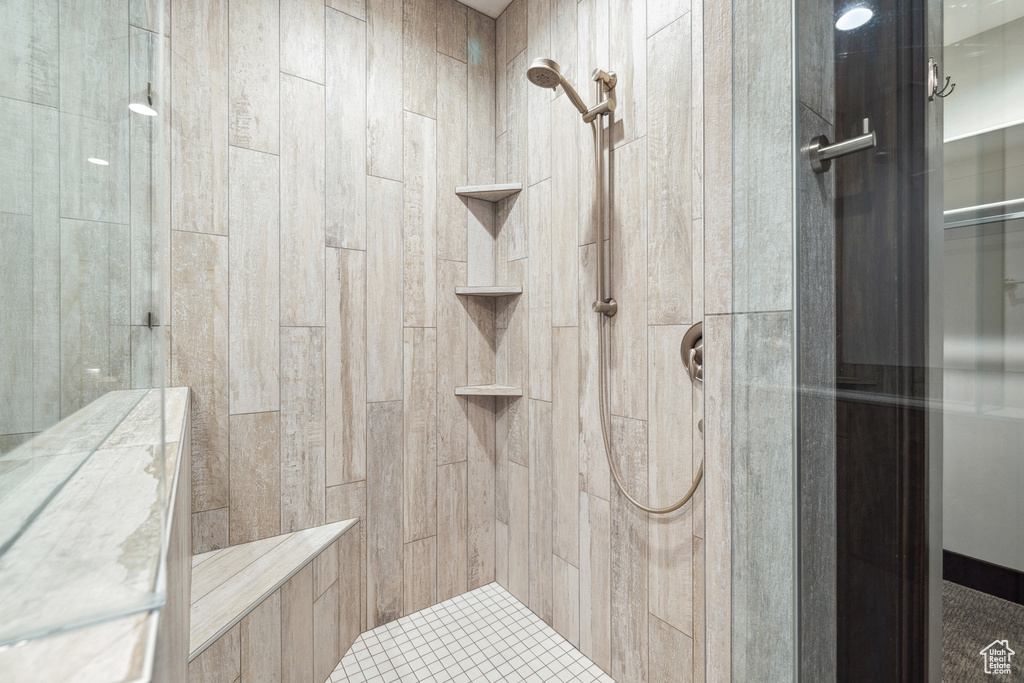 Bathroom with a tile shower