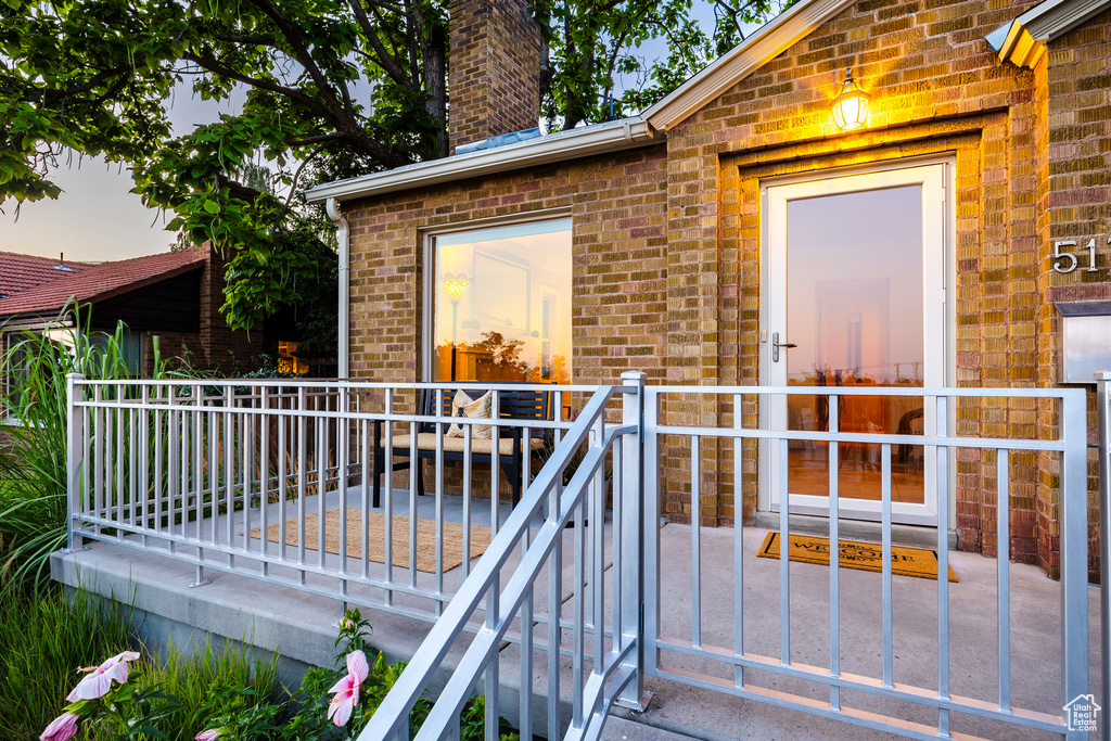 View of exterior entry at dusk