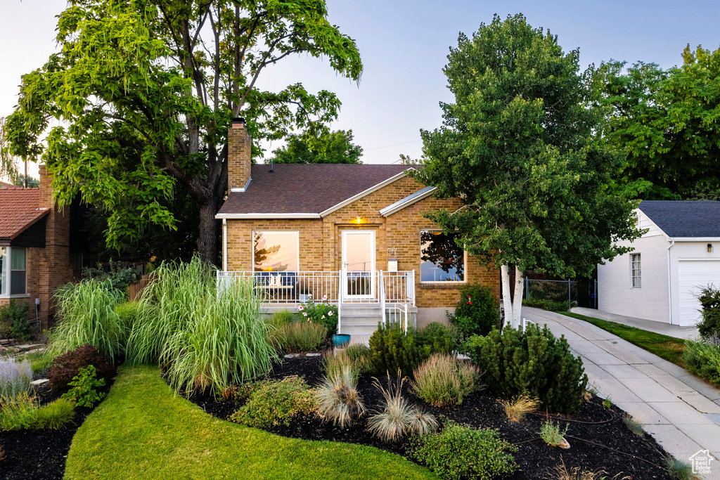 View of front of property featuring a garage