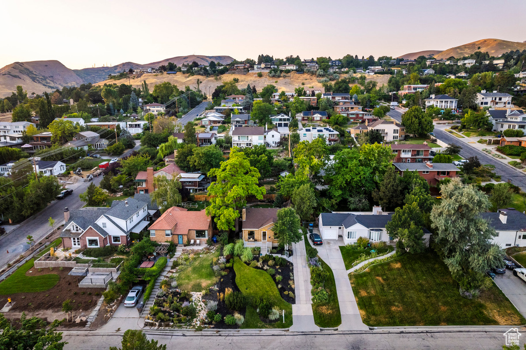 Aerial view at dusk featuring a mountain view