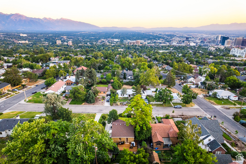 Aerial view at dusk featuring a mountain view