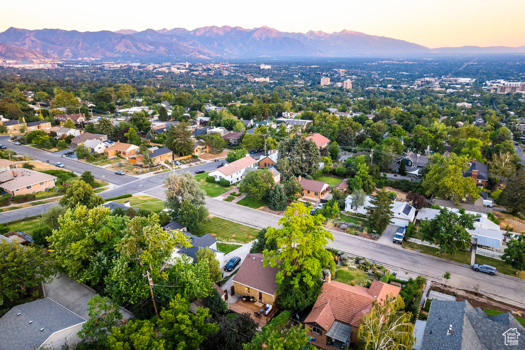 Aerial view at dusk featuring a mountain view