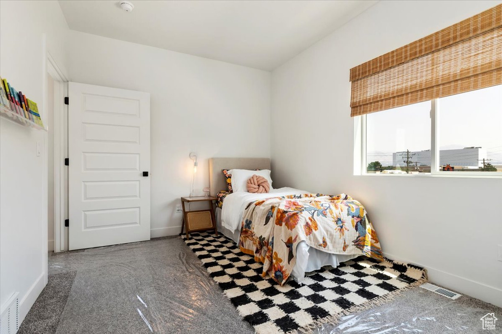 Bedroom featuring carpet flooring