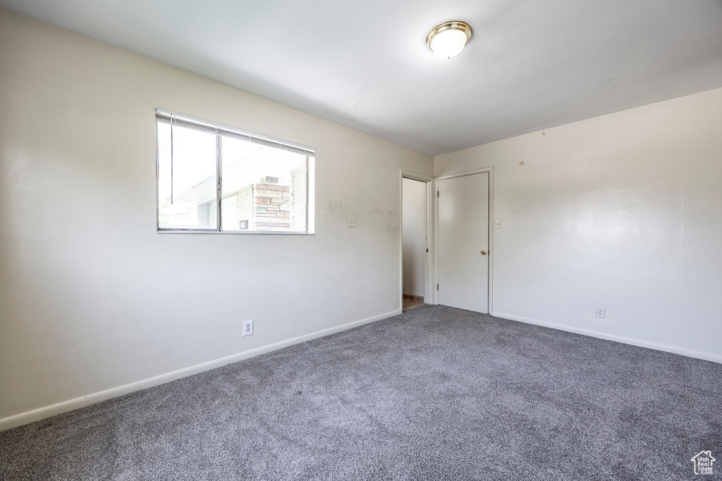 View of carpeted spare room